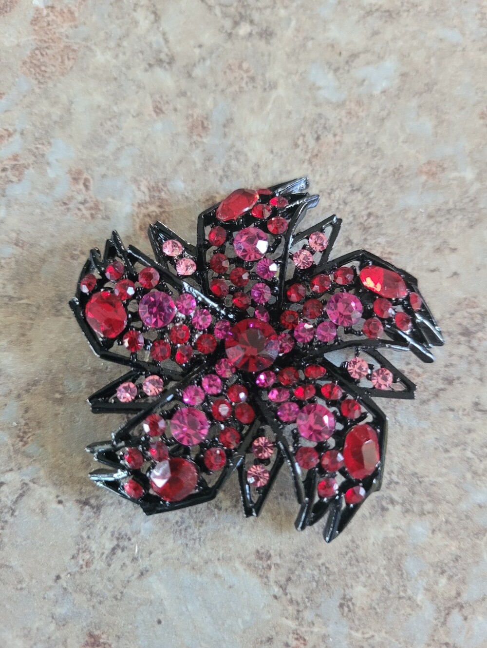 Gerrys Vintage Black Tone Metal Brooch with Pink and Red Rhinestones